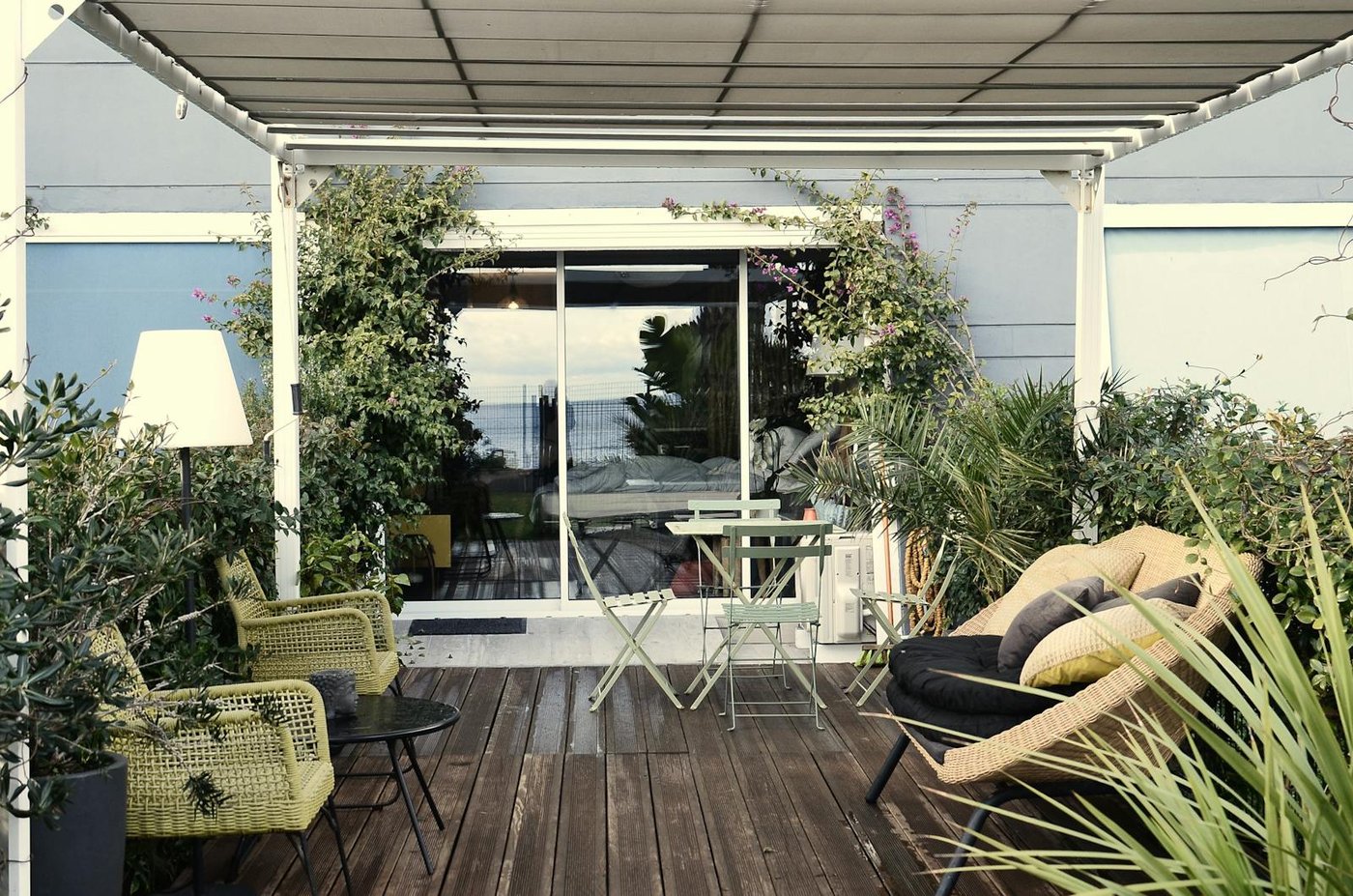 Luxury backyard patio with comfortable outdoor furniture