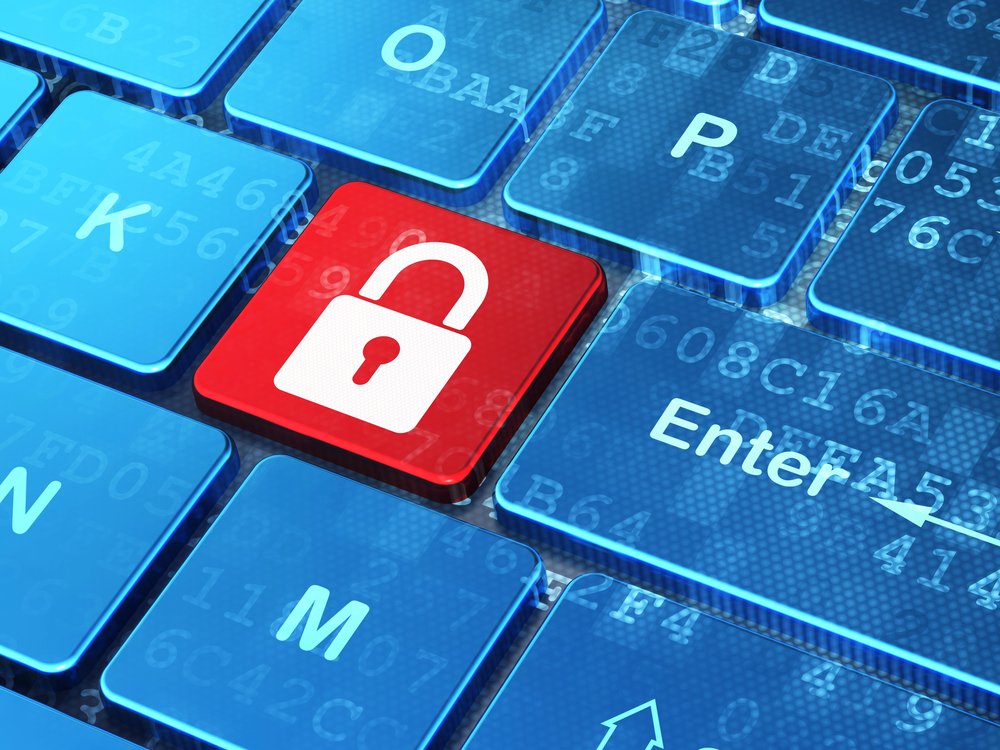 Cybersecurity concept with padlock on computer keyboard