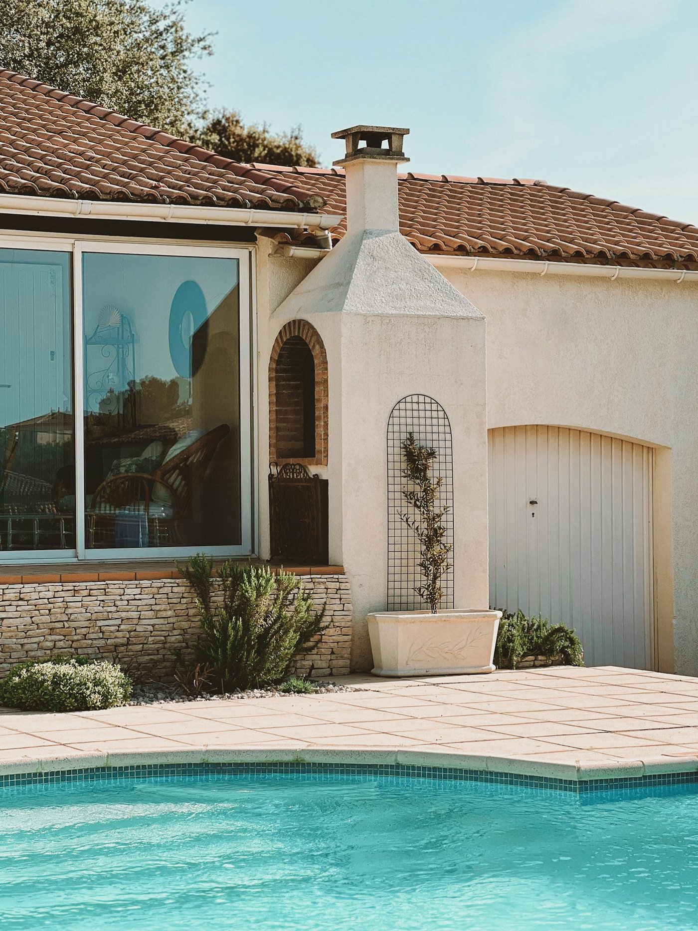 Elegant home exterior with outdoor swimming pool